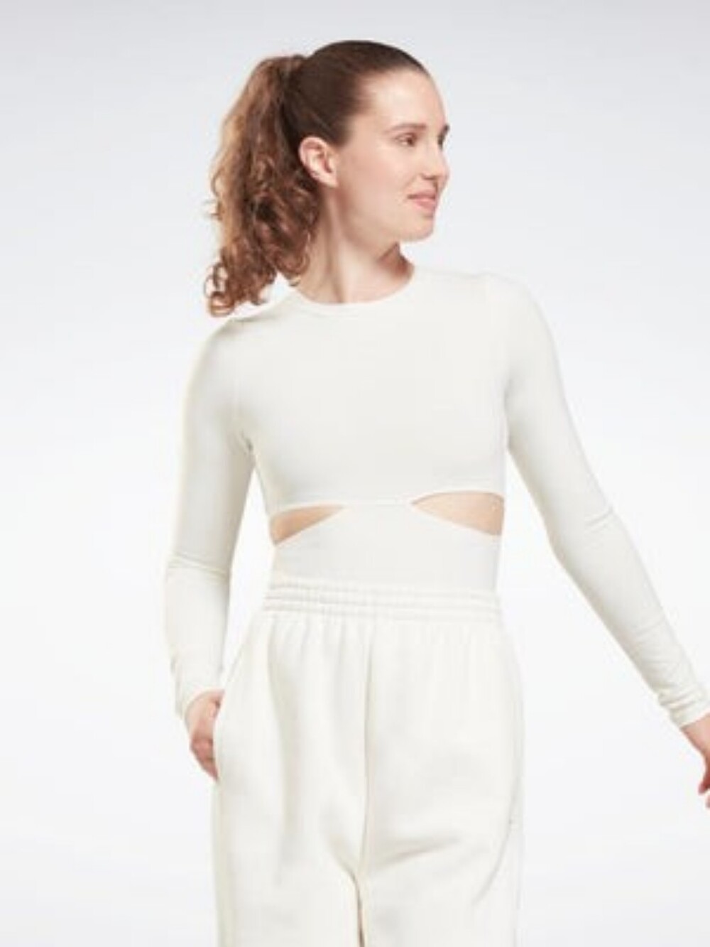 BNWT Reebok Long Sleeve Cream Onepiece Bodysuit with Waist Cutouts